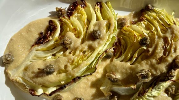 charred cabbage with anchovy almond sauce 